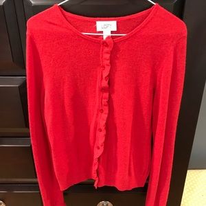Red cardigan sweater with ruffle trim